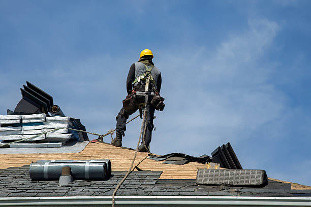 Professional Roof Replacement technician working in Agency, MO